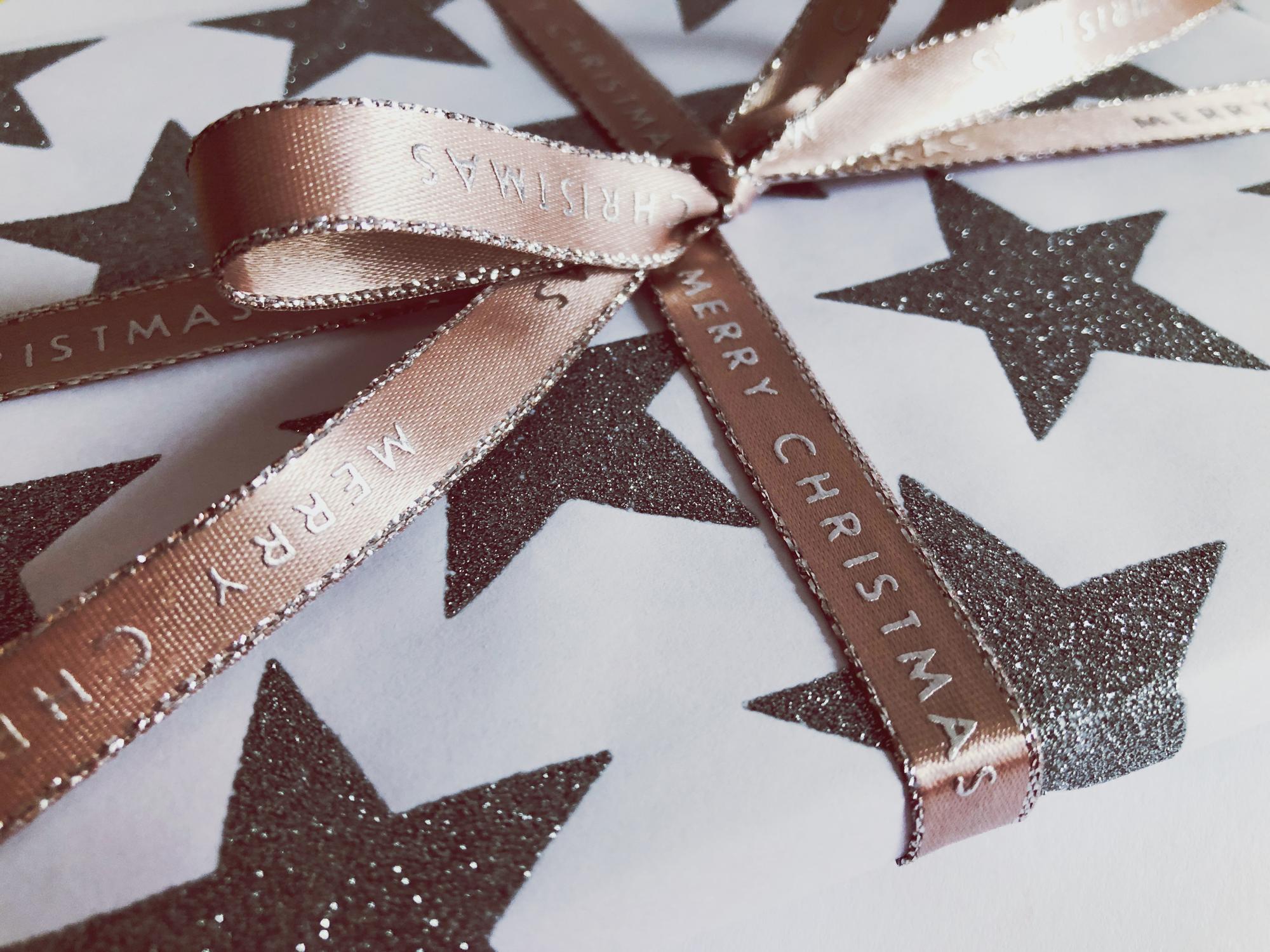 Premium packaging with embroidered label